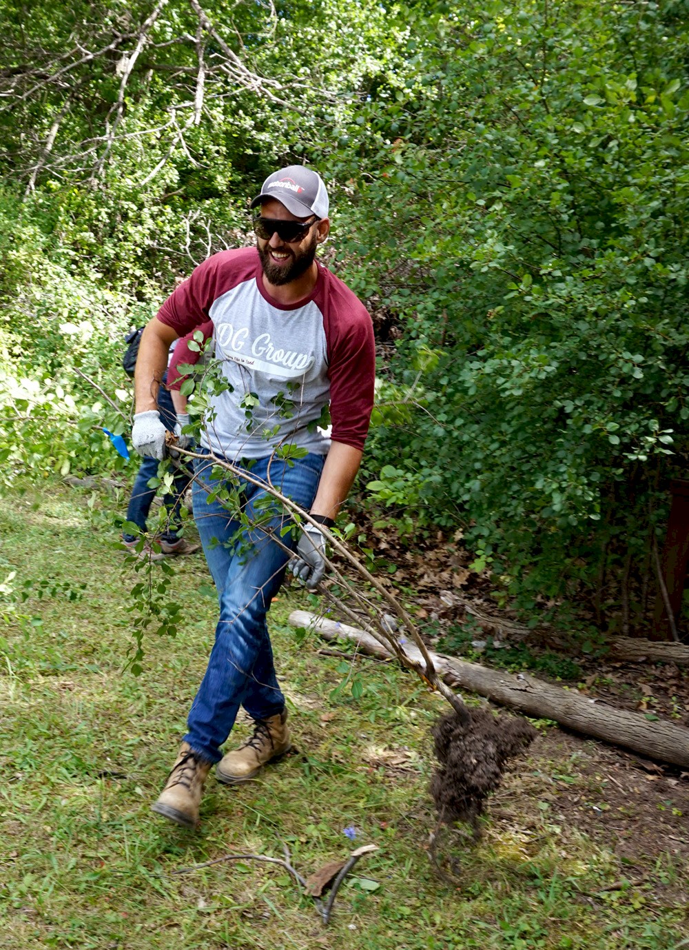 DG Group staff cleaning up the environment.