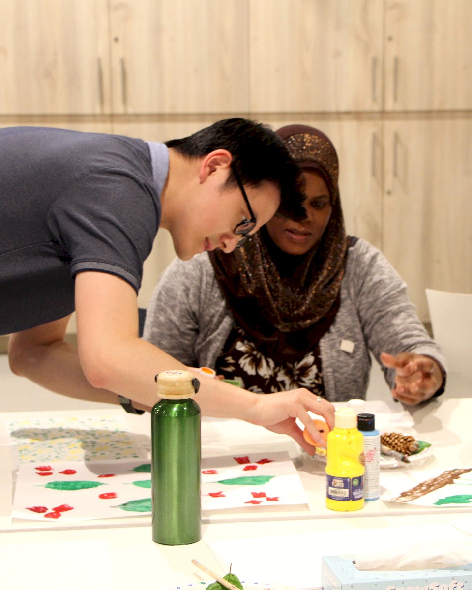 DG Group staff helping create art at Thorncliffe Park Community Hub.