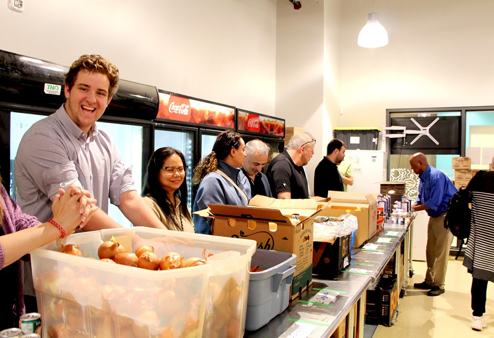 DG Group staff handing out food at Thorncliffe Park Community Hub.