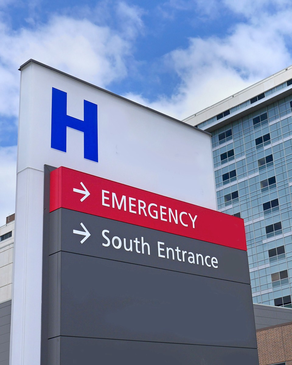Outside hospital directional sign.