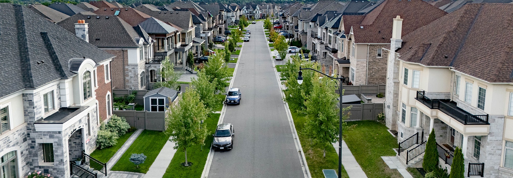 Row of homes on a street.